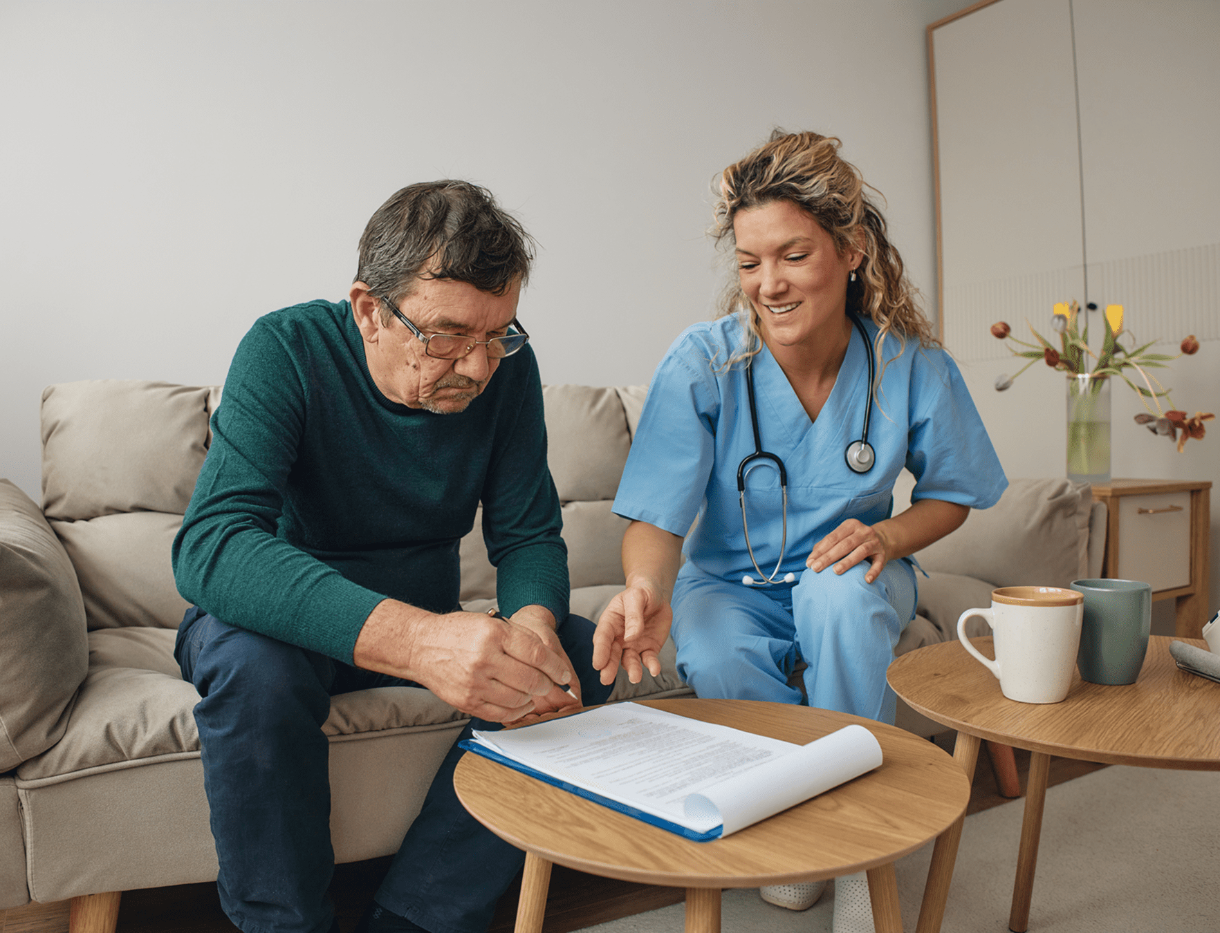 Elderly man consulting with healthcare professional