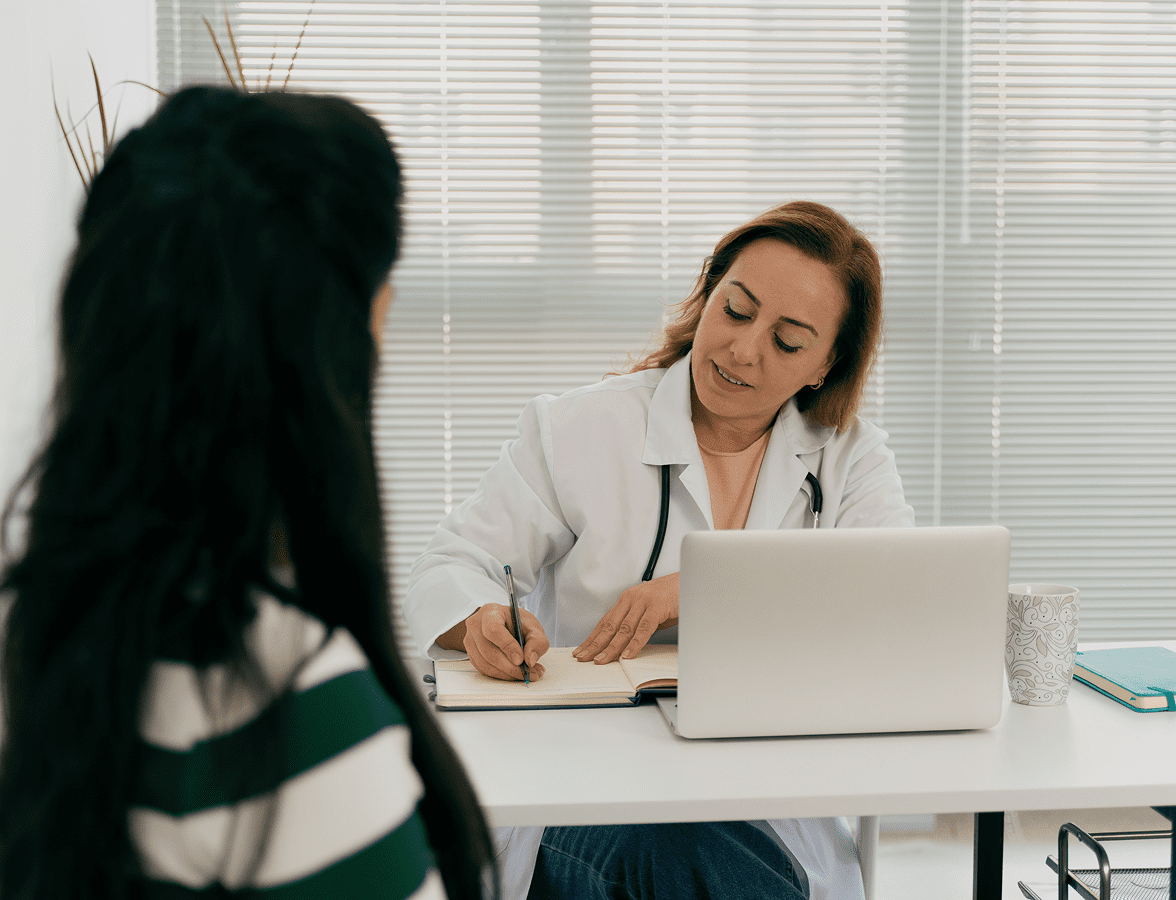 Doctor consulting with patient in office
