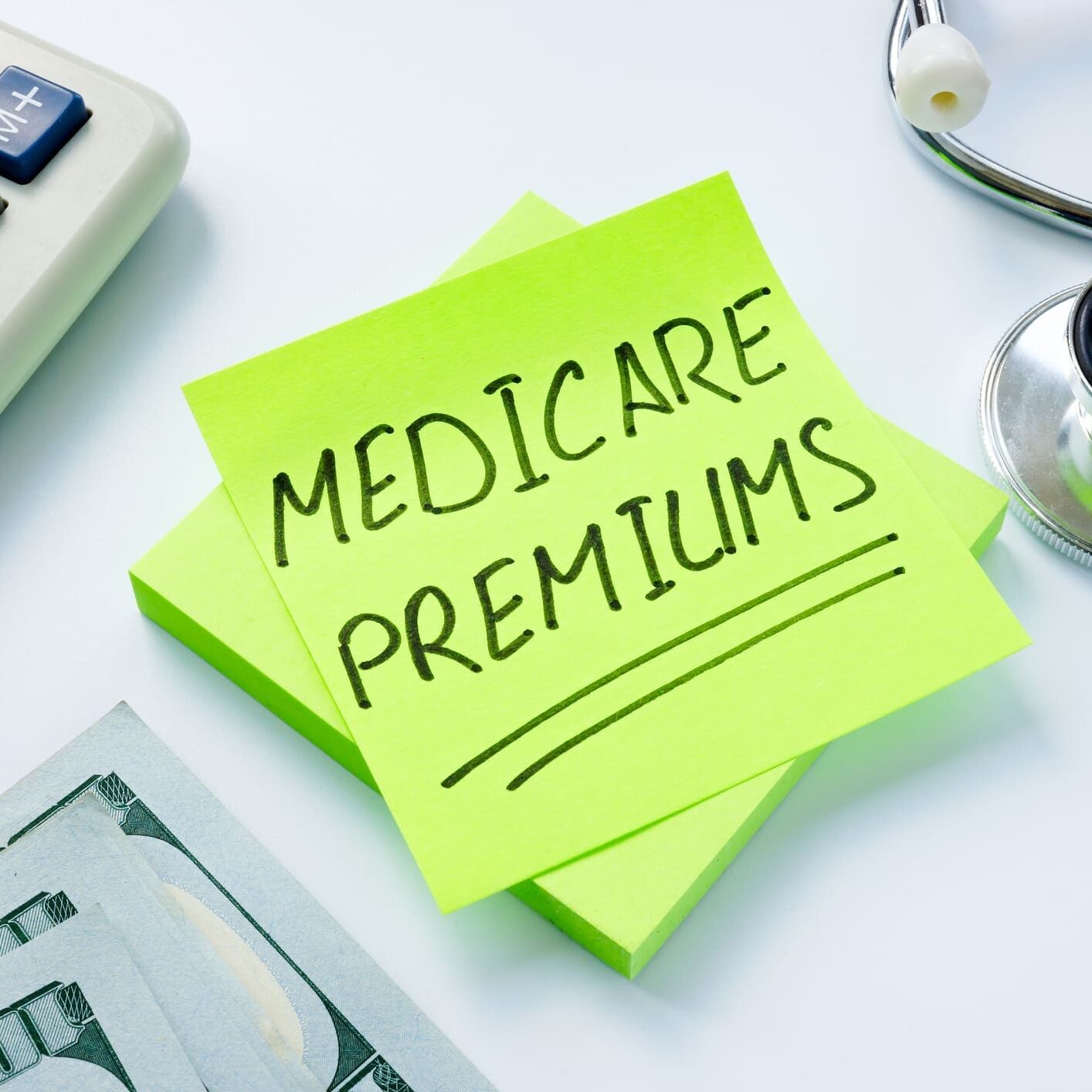 Medicare premiums written on the sticker and stethoscope.